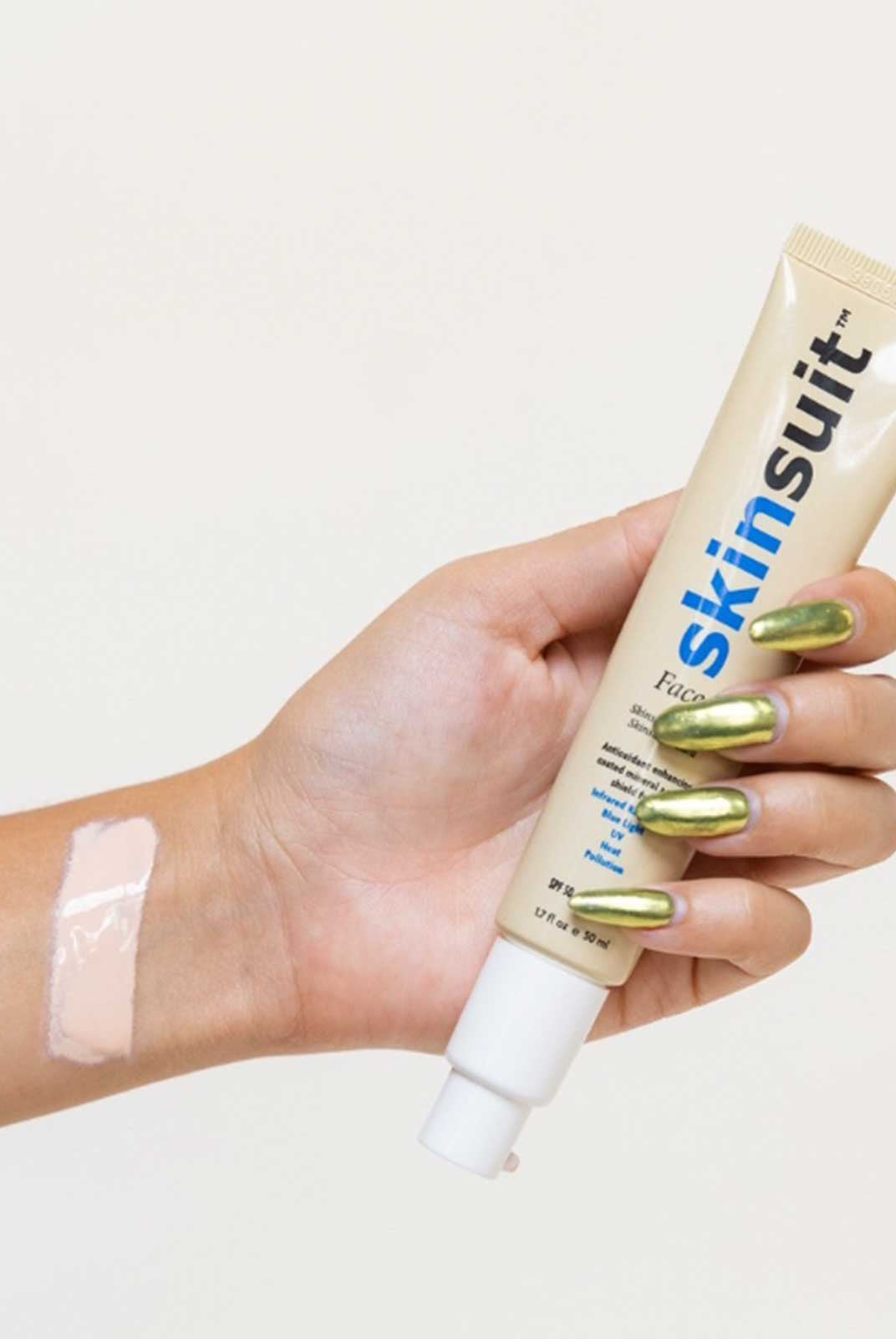 A Girl Holding Skinsuit Cream